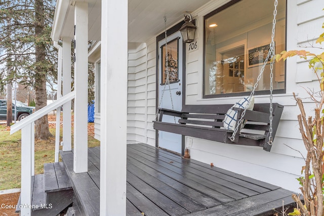 wooden deck with a porch