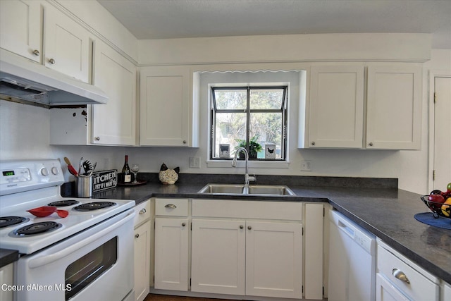 kitchen with white appliances, white cabinetry, and sink