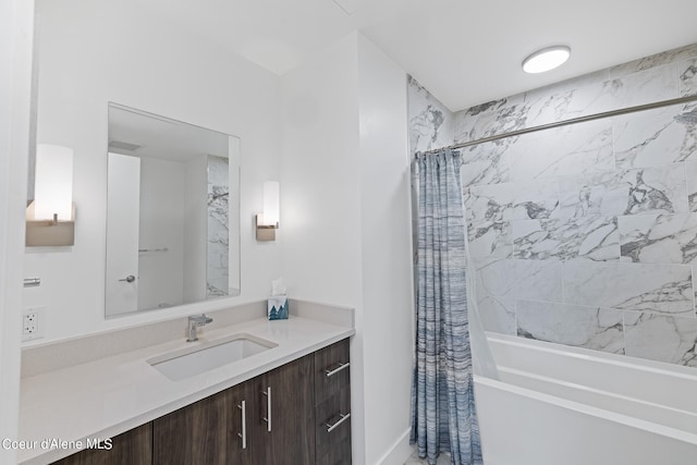 bathroom with shower / bath combo with shower curtain and vanity