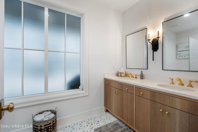 bathroom featuring tile patterned floors and vanity