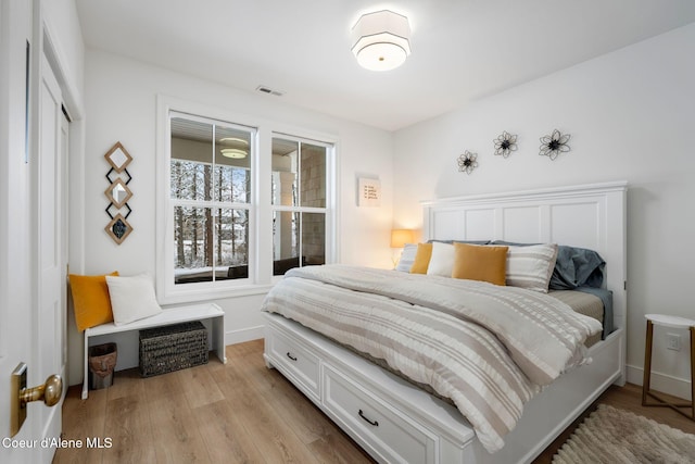 bedroom featuring light hardwood / wood-style flooring