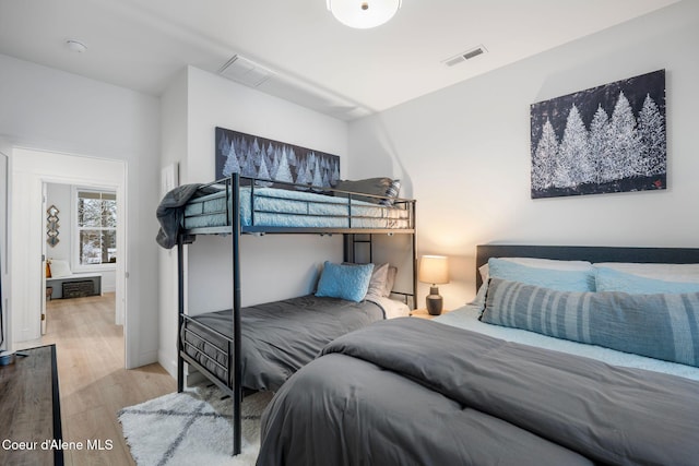 bedroom with light hardwood / wood-style floors