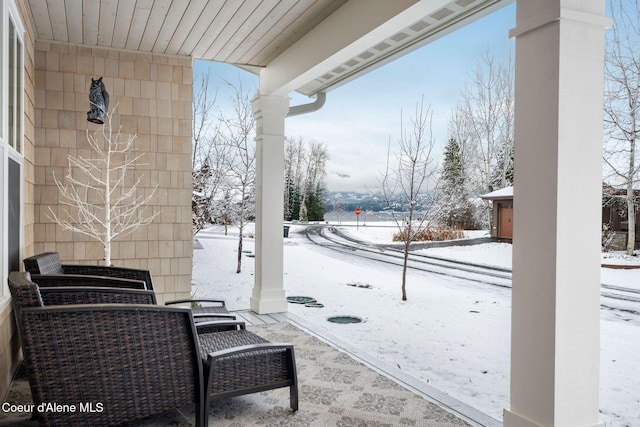 view of snow covered patio