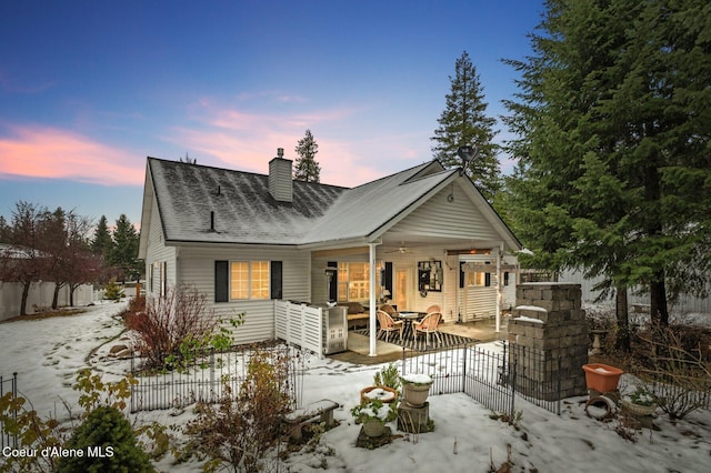 view of snow covered property