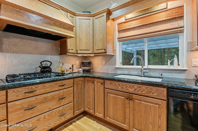 kitchen with dark stone counters, sink, gas stovetop, black dishwasher, and custom range hood