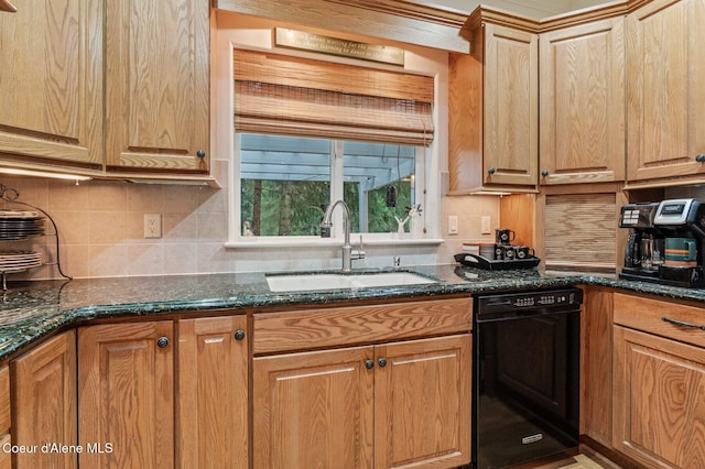 kitchen featuring decorative backsplash, black dishwasher, dark stone counters, and sink