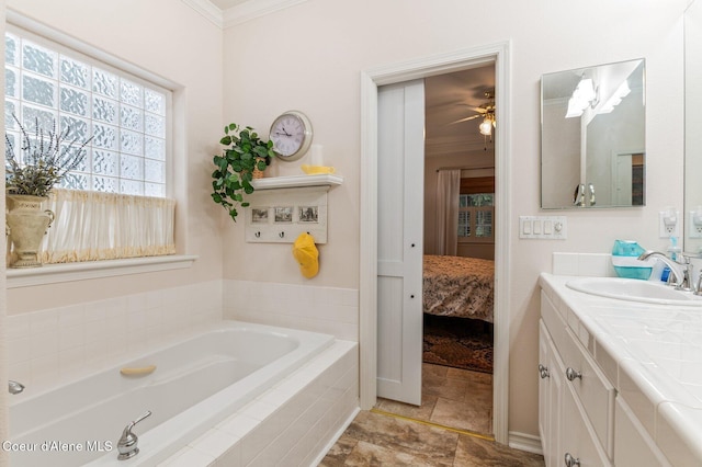 bathroom with vanity, ceiling fan, crown molding, and tiled bath