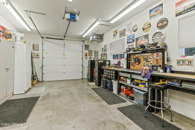 garage with a workshop area