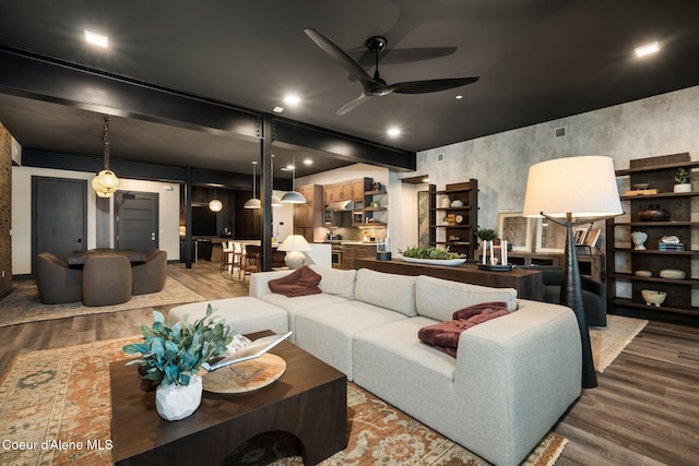 living room with recessed lighting, wood finished floors, visible vents, and a ceiling fan