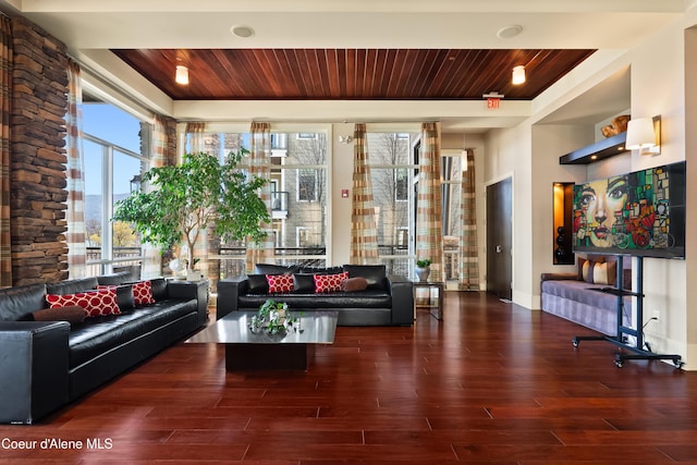 interior space with wood ceiling and wood finished floors