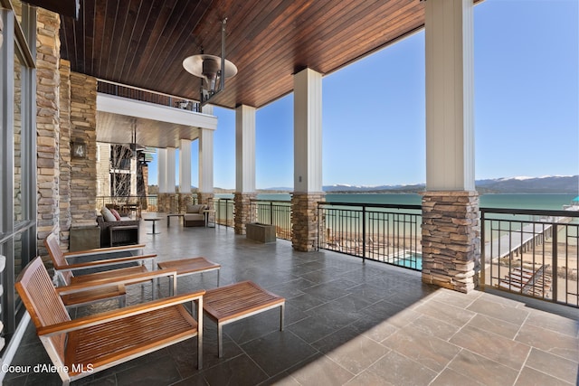 view of patio / terrace featuring a water view