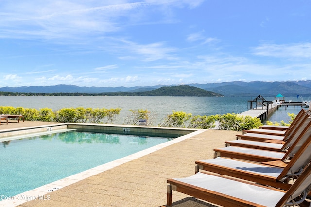 pool with a water and mountain view