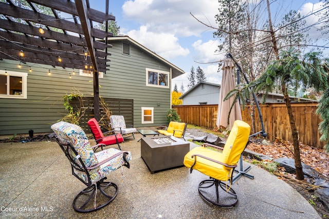 view of patio / terrace featuring a pergola and an outdoor fire pit