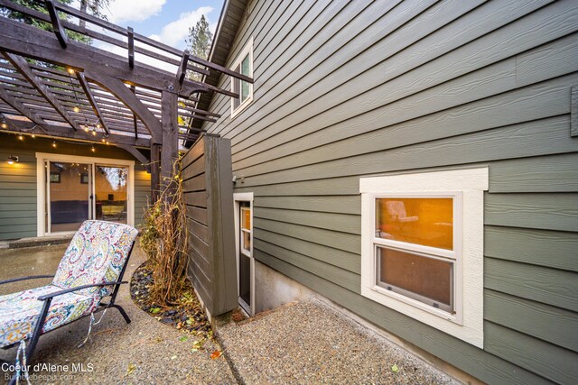 view of home's exterior featuring a pergola