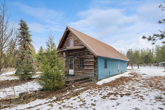 view of snow covered property