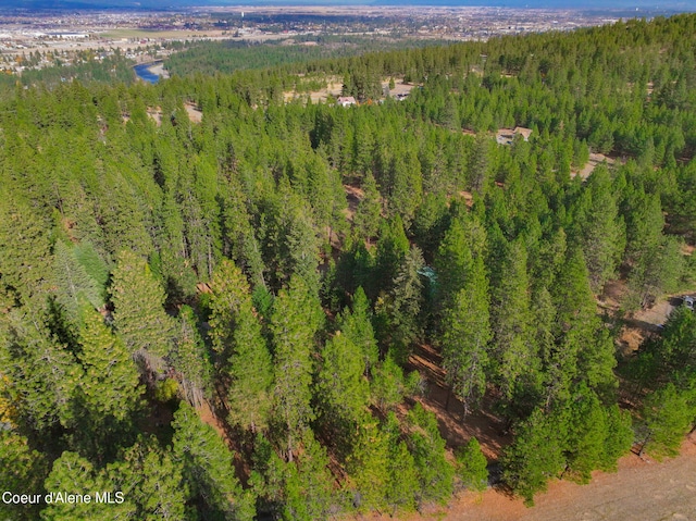 694 S Signal Point Rd, Post Falls, ID 83854 - aerial view of property and surrounding area featuring a heavily wooded area