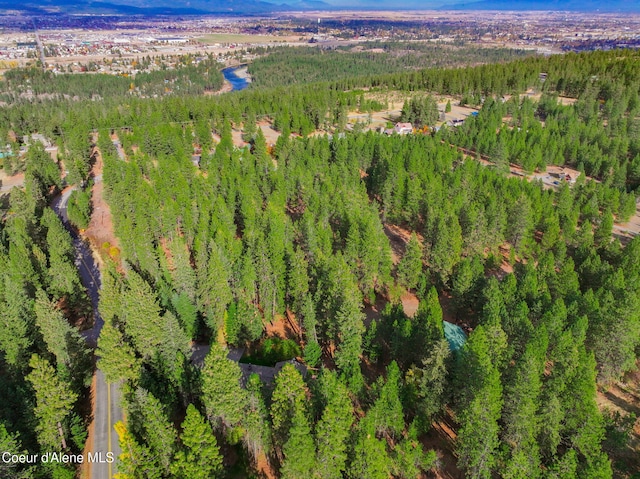 694 S Signal Point Rd, Post Falls, ID 83854 - aerial view of property and surrounding area featuring a heavily wooded area