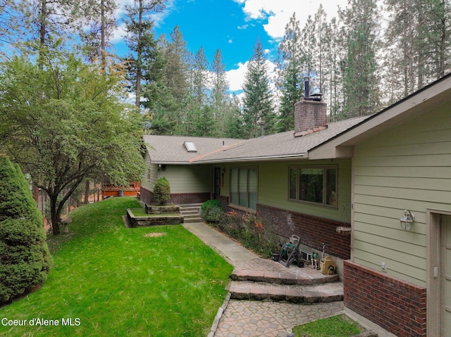 694 S Signal Point Rd, Post Falls, ID 83854 - view of grassy yard