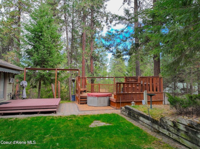 694 S Signal Point Rd, Post Falls, ID 83854 - view of grassy yard with a deck