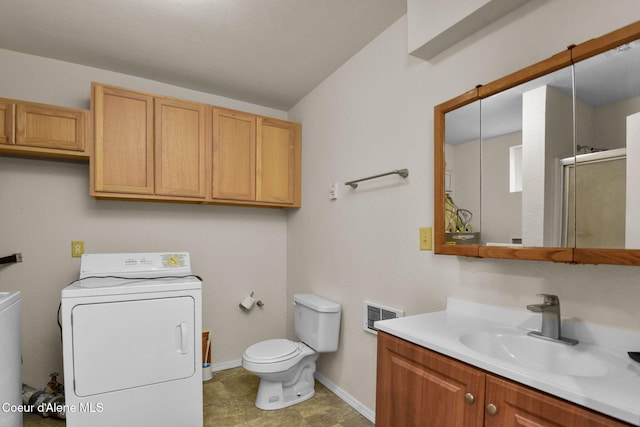 694 S Signal Point Rd, Post Falls, ID 83854 - bathroom with an enclosed shower, vanity, and independent washer and dryer