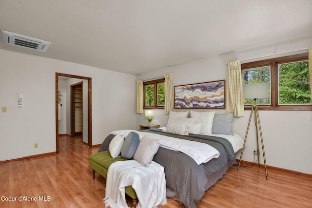 694 S Signal Point Rd, Post Falls, ID 83854 - bedroom featuring light wood-style flooring