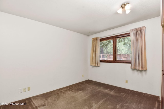 694 S Signal Point Rd, Post Falls, ID 83854 - empty room featuring dark carpet
