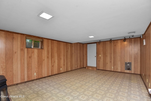 694 S Signal Point Rd, Post Falls, ID 83854 - finished basement featuring wood walls and light floors