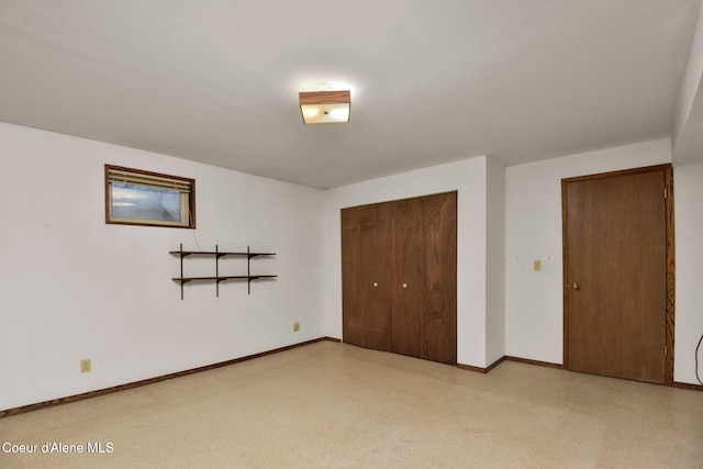 694 S Signal Point Rd, Post Falls, ID 83854 - unfurnished bedroom with baseboards and a closet