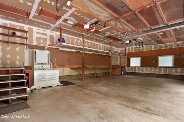 694 S Signal Point Rd, Post Falls, ID 83854 - garage featuring a garage door opener