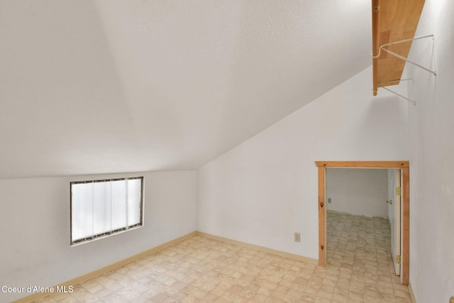 694 S Signal Point Rd, Post Falls, ID 83854 - bonus room featuring lofted ceiling and light flooring