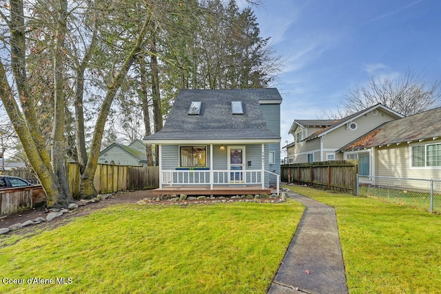 bungalow featuring a front lawn and covered porch