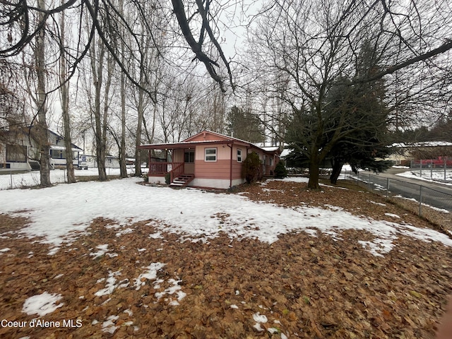 view of yard covered in snow