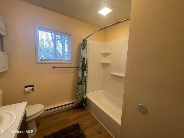 full bathroom featuring shower / tub combo, vanity, baseboard heating, hardwood / wood-style floors, and toilet