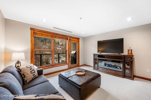 living room featuring light carpet