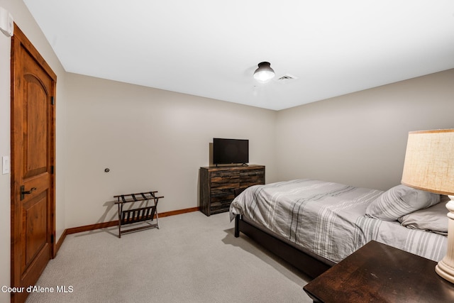 carpeted bedroom featuring a closet