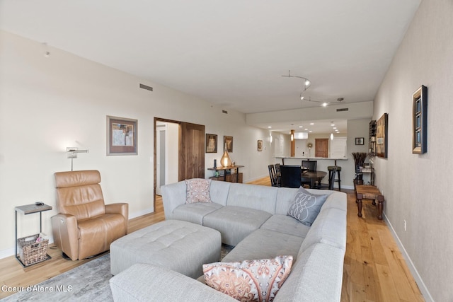 living room featuring light wood-type flooring