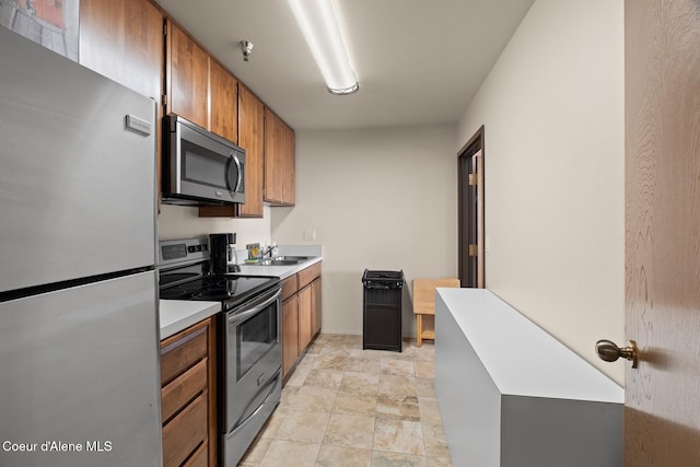 kitchen featuring sink and appliances with stainless steel finishes