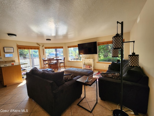 tiled living room with a textured ceiling