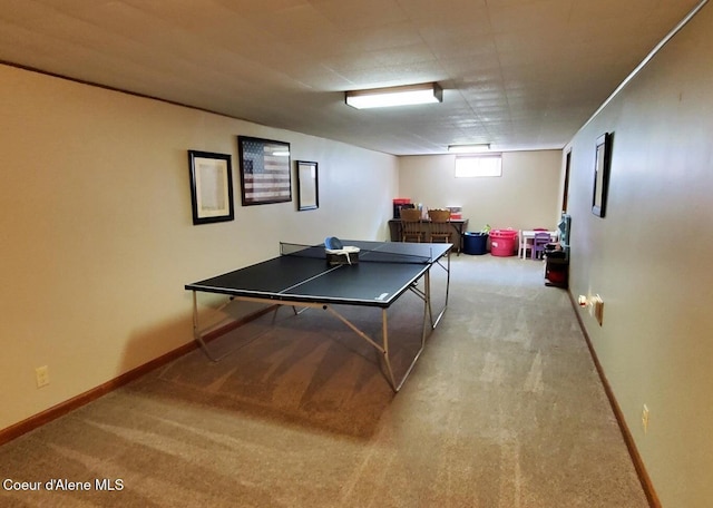 game room featuring light carpet