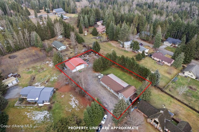 11673 N Boyer Rd, Sandpoint, ID 83864 - view of property location featuring property parcel outlined and a forest