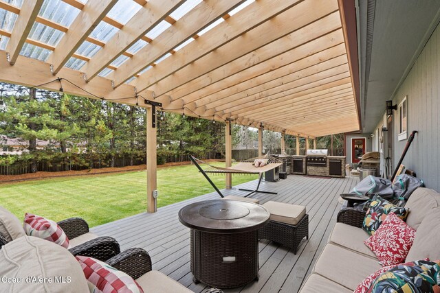 11673 N Boyer Rd, Sandpoint, ID 83864 - deck with a pergola, outdoor lounge area, and grilling area