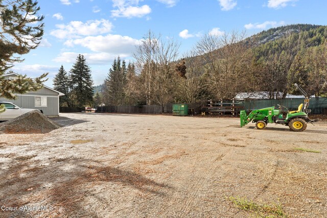 11673 N Boyer Rd, Sandpoint, ID 83864 - view of yard with a mountain view