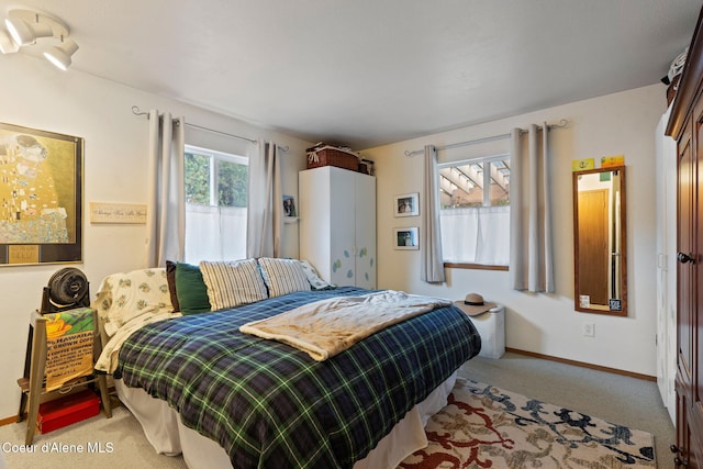 11673 N Boyer Rd, Sandpoint, ID 83864 - carpeted bedroom featuring baseboards