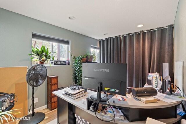 11673 N Boyer Rd, Sandpoint, ID 83864 - home office featuring wood finished floors, recessed lighting, and baseboards