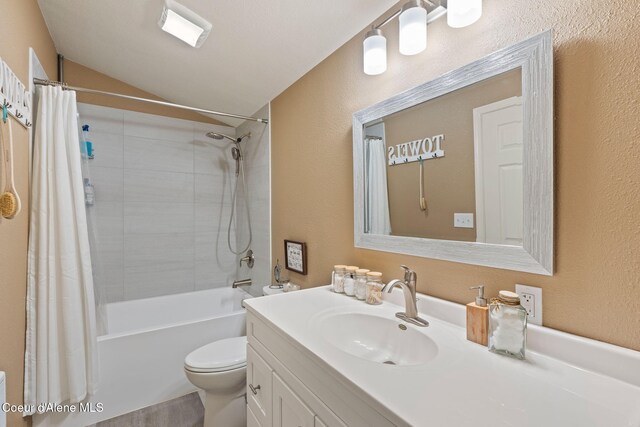 11673 N Boyer Rd, Sandpoint, ID 83864 - bathroom with toilet, vanity, shower / bathtub combination with curtain, a textured wall, and vaulted ceiling
