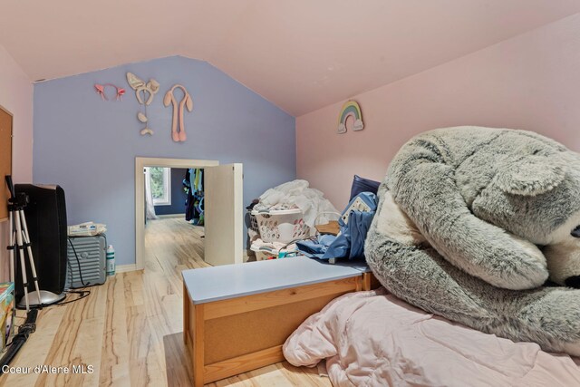 11673 N Boyer Rd, Sandpoint, ID 83864 - bedroom featuring wood finished floors and vaulted ceiling
