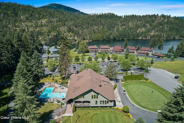 birds eye view of property featuring a water and mountain view