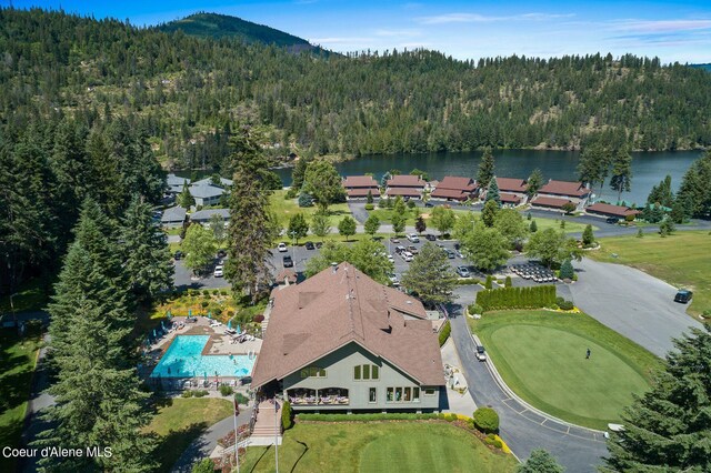 5299 W Green Ct # 5, Rathdrum, ID 83858 - aerial view of property and surrounding area featuring a heavily wooded area and a water and mountain view