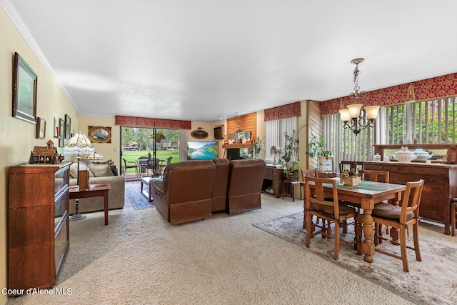 dining room with light colored carpet, crown molding, and a notable chandelier