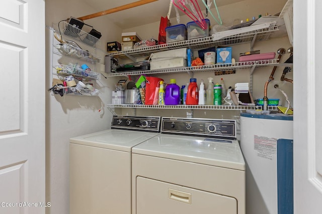 5299 W Green Ct # 5, Rathdrum, ID 83858 - laundry area featuring water heater and washing machine and dryer